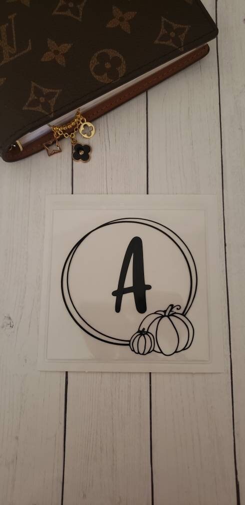 Adhesive vinyl pumpkin sticker pocket