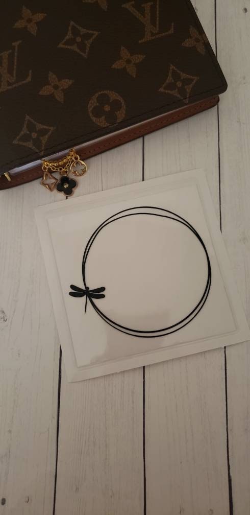 Adhesive vinyl dragonfly sticker pocket